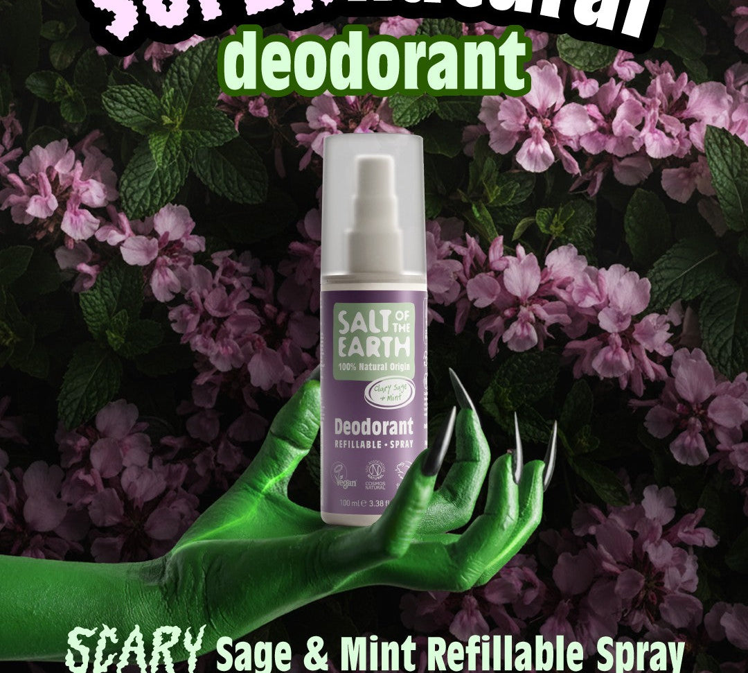 Halloween-themed image showing Salt of the Earth Sage & Mint natural refillable deodorant spray held by a green hand among purple flowers, promoting the ‘SUPERnatural’ deodorant campaign.